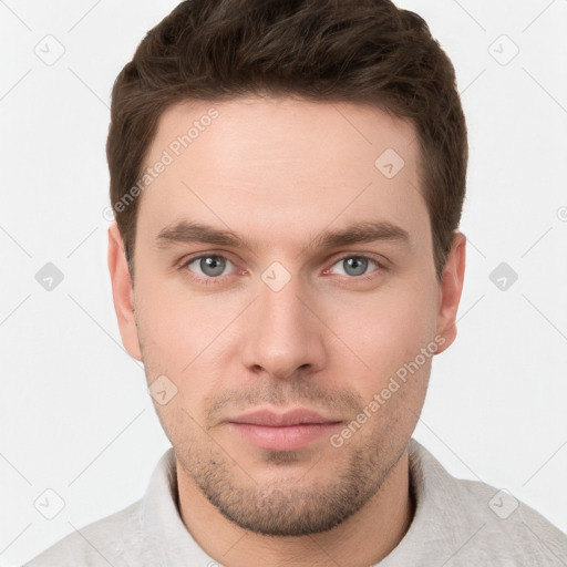 Neutral white young-adult male with short  brown hair and grey eyes