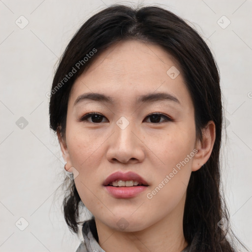 Joyful white young-adult female with medium  black hair and brown eyes