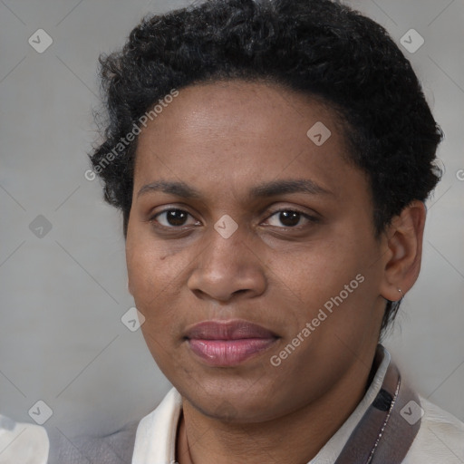 Joyful black adult female with short  brown hair and brown eyes