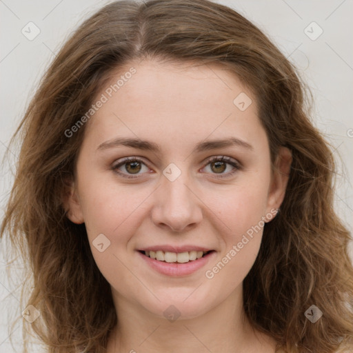 Joyful white young-adult female with long  brown hair and green eyes