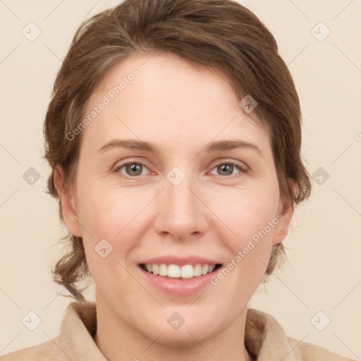 Joyful white young-adult female with medium  brown hair and green eyes