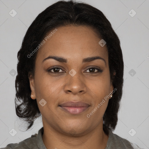 Joyful black young-adult female with medium  brown hair and brown eyes
