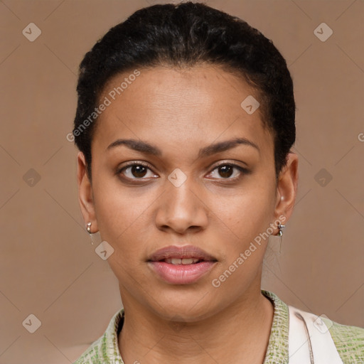 Joyful latino young-adult female with short  black hair and brown eyes