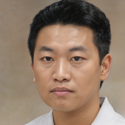 Neutral asian young-adult male with short  black hair and brown eyes