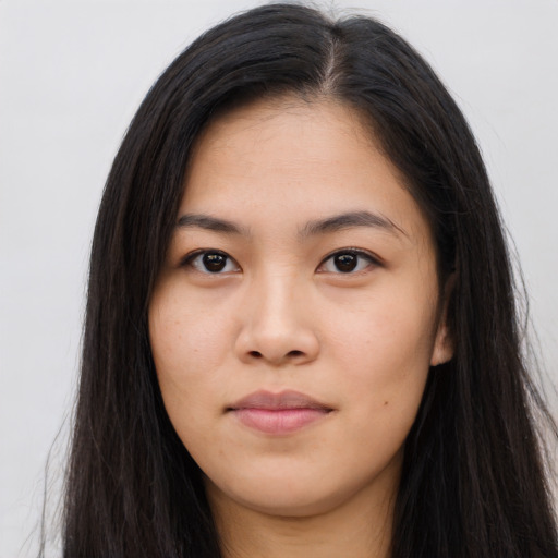 Neutral asian young-adult female with long  brown hair and brown eyes