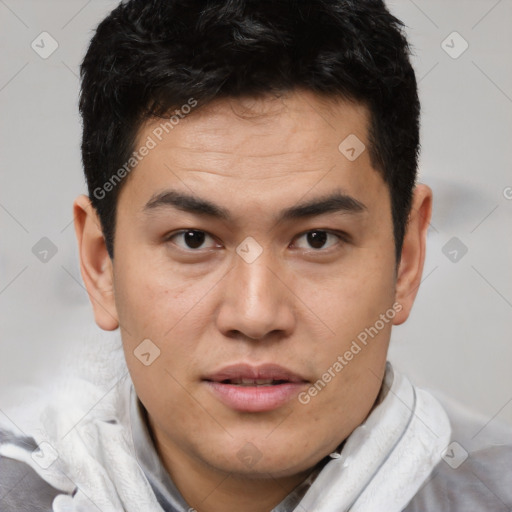 Joyful latino young-adult male with short  brown hair and brown eyes