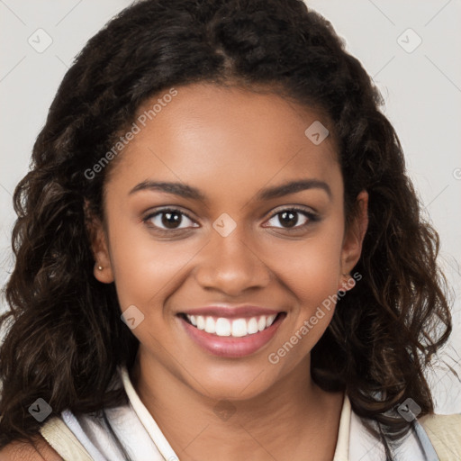 Joyful black young-adult female with long  brown hair and brown eyes