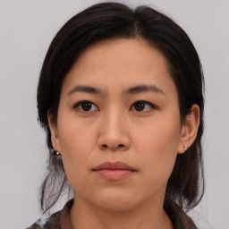 Neutral asian young-adult female with medium  brown hair and brown eyes