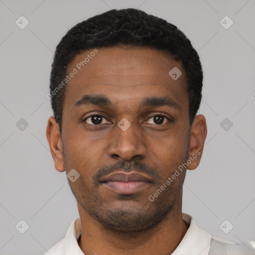 Neutral black young-adult male with short  black hair and brown eyes