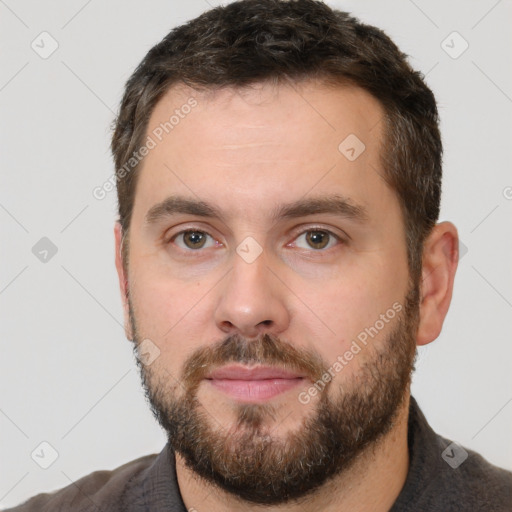 Neutral white young-adult male with short  brown hair and brown eyes