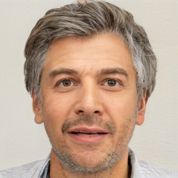 Neutral white adult male with short  brown hair and brown eyes