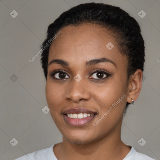 Joyful latino young-adult female with short  black hair and brown eyes