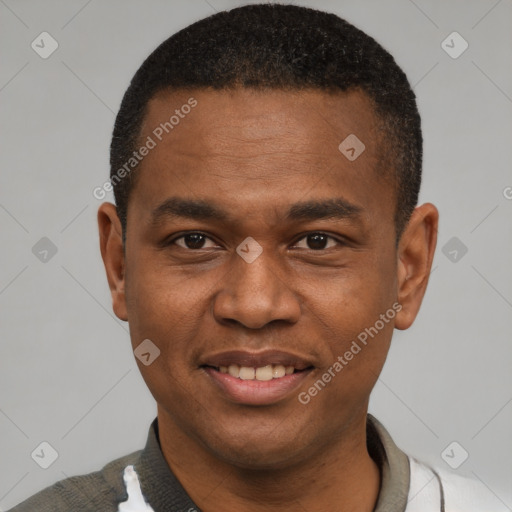 Joyful latino young-adult male with short  brown hair and brown eyes