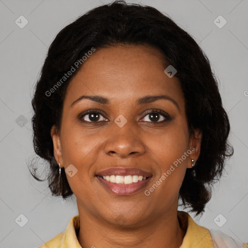 Joyful black young-adult female with medium  brown hair and brown eyes