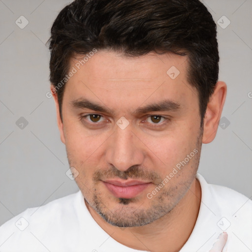 Joyful white young-adult male with short  brown hair and brown eyes