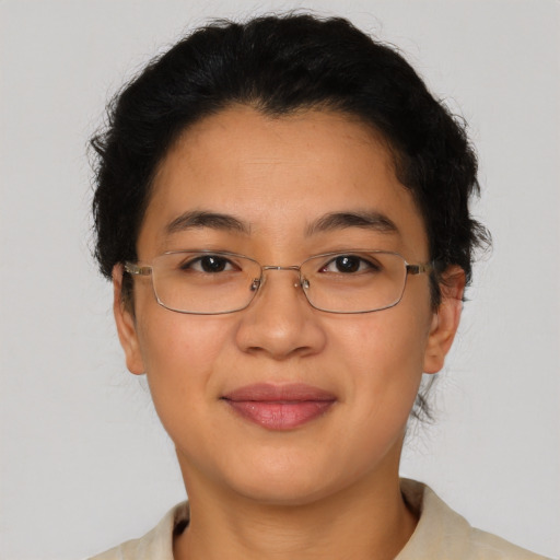 Joyful asian young-adult female with short  brown hair and brown eyes