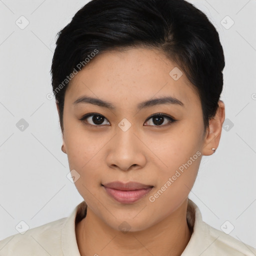Joyful asian young-adult female with short  black hair and brown eyes