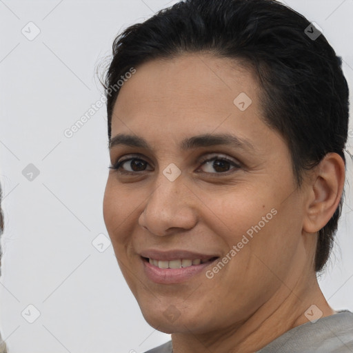 Joyful white adult female with short  brown hair and brown eyes