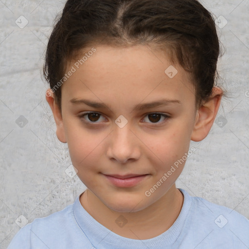 Joyful white child female with short  brown hair and brown eyes