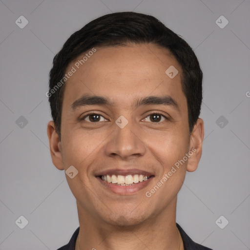 Joyful white young-adult male with short  black hair and brown eyes