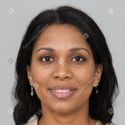 Joyful black young-adult female with medium  brown hair and brown eyes