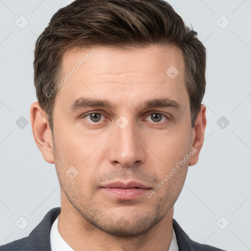 Neutral white young-adult male with short  brown hair and brown eyes