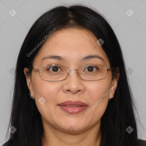 Joyful white adult female with long  brown hair and brown eyes