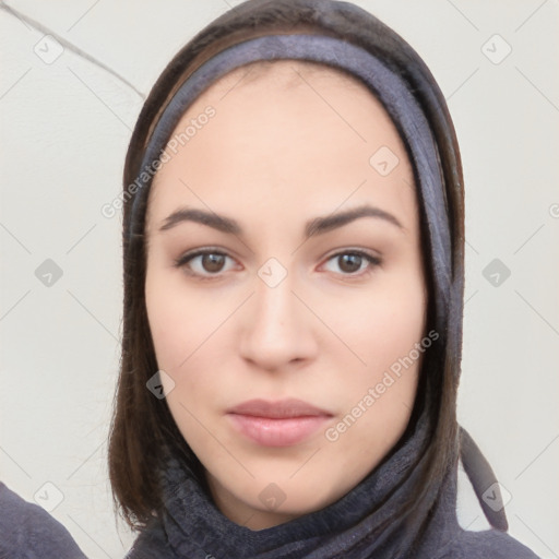 Neutral white young-adult female with long  brown hair and brown eyes