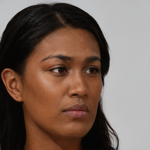 Neutral black young-adult female with long  black hair and brown eyes