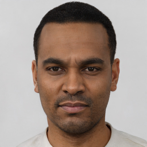 Neutral black young-adult male with short  black hair and brown eyes