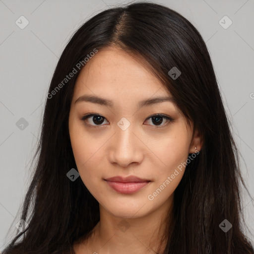 Joyful asian young-adult female with long  brown hair and brown eyes