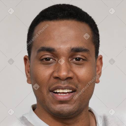 Joyful black young-adult male with short  black hair and brown eyes