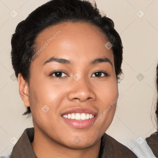 Joyful latino young-adult female with short  brown hair and brown eyes