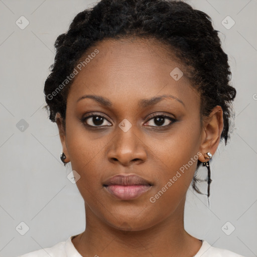 Neutral black young-adult female with short  brown hair and brown eyes