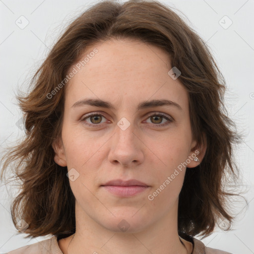 Joyful white young-adult female with medium  brown hair and green eyes