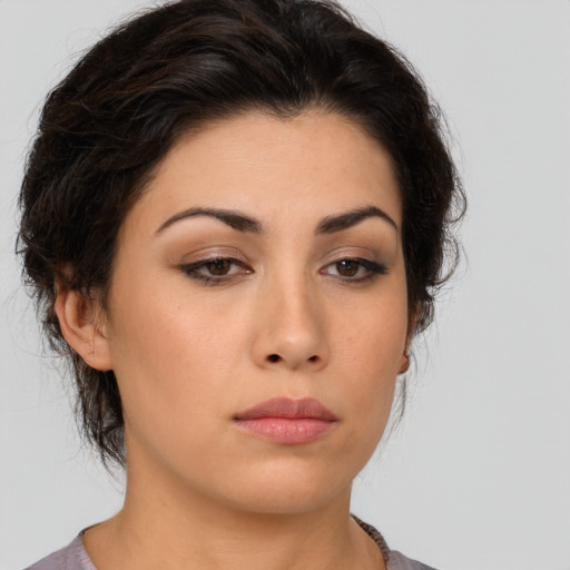 Neutral asian young-adult female with medium  brown hair and brown eyes