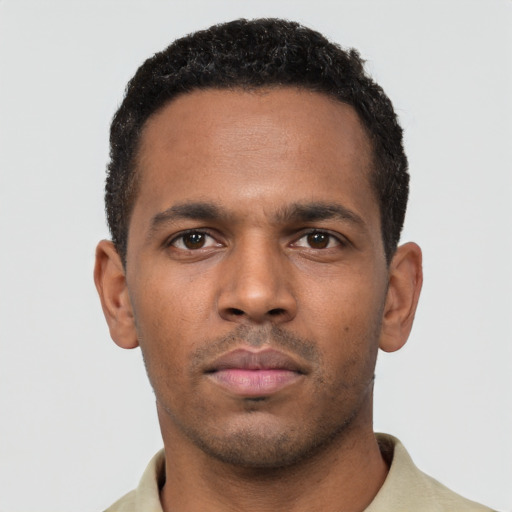 Neutral black young-adult male with short  brown hair and brown eyes