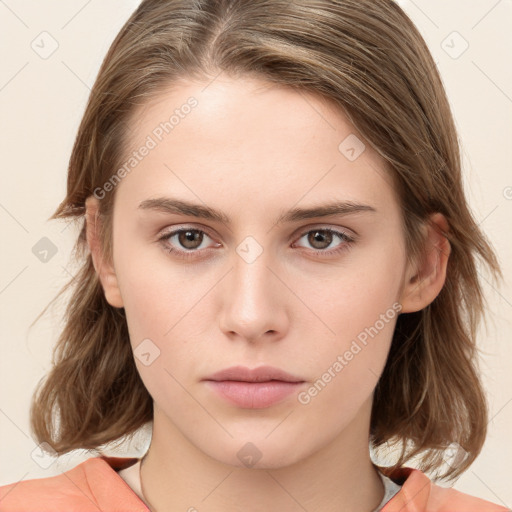 Neutral white young-adult female with medium  brown hair and brown eyes