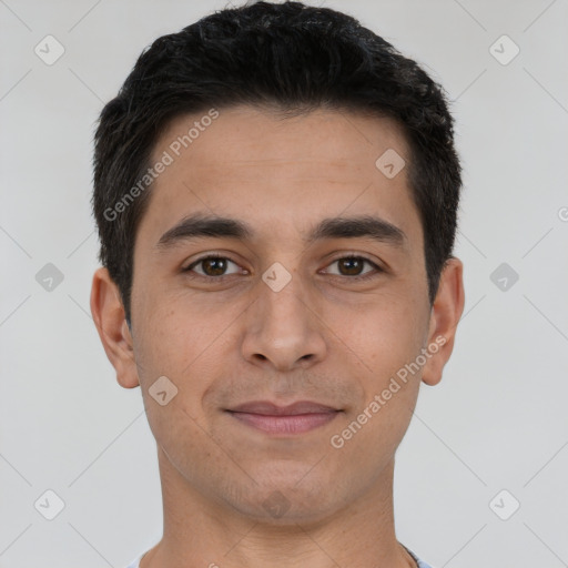 Joyful white young-adult male with short  black hair and brown eyes