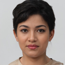 Joyful asian young-adult female with short  black hair and brown eyes