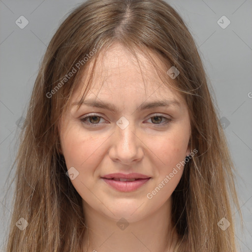 Joyful white young-adult female with long  brown hair and grey eyes