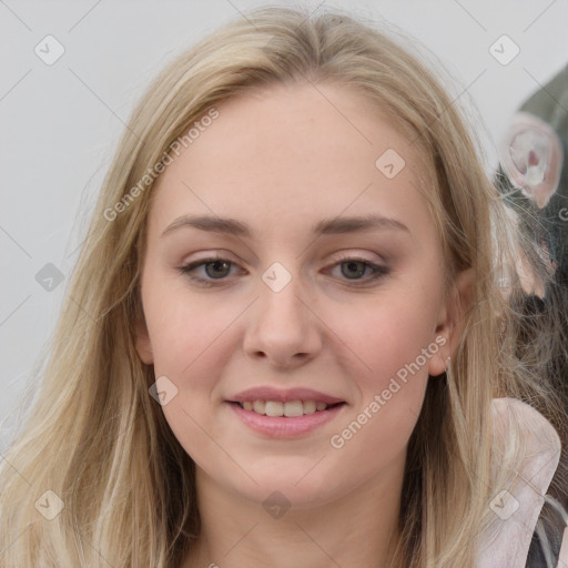 Joyful white young-adult female with long  brown hair and grey eyes