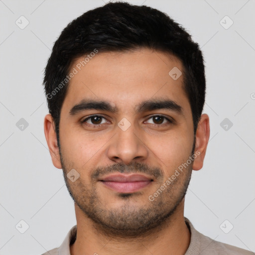 Joyful latino young-adult male with short  black hair and brown eyes