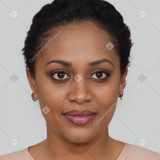 Joyful black young-adult female with short  brown hair and brown eyes