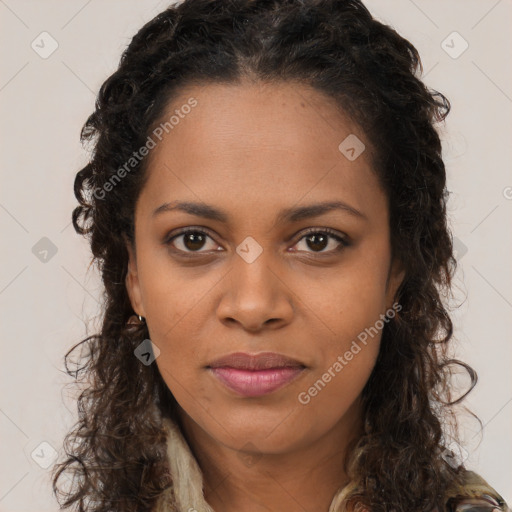 Joyful black young-adult female with long  brown hair and brown eyes