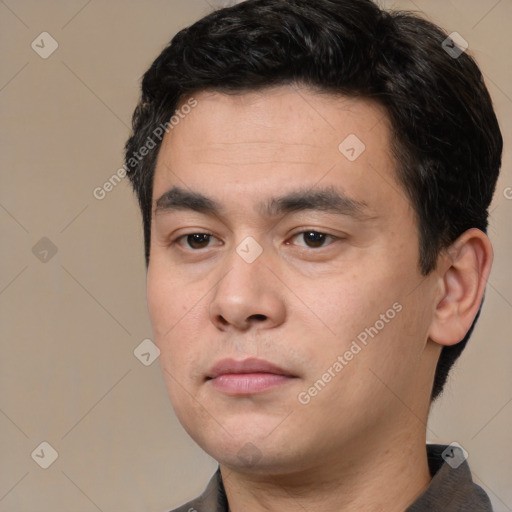 Neutral white young-adult male with short  black hair and brown eyes