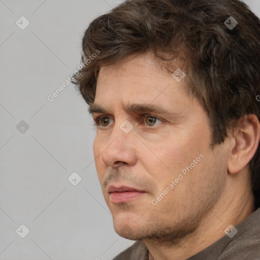 Neutral white adult male with short  brown hair and brown eyes