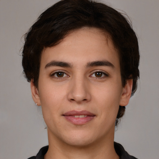 Joyful white young-adult male with medium  brown hair and brown eyes