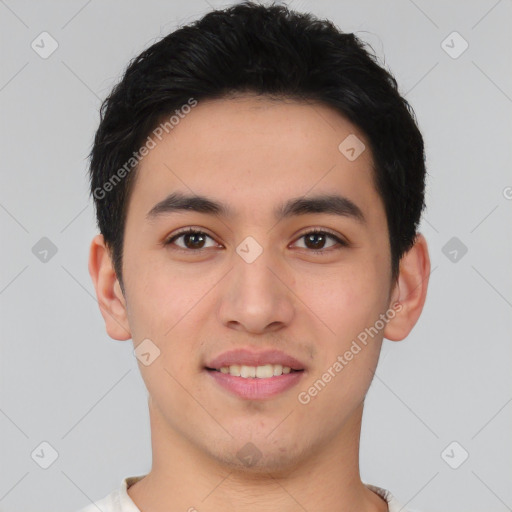 Joyful white young-adult male with short  black hair and brown eyes