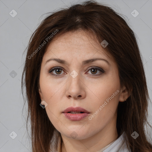 Neutral white young-adult female with long  brown hair and brown eyes